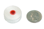 Style U bobbin compared to a U.S. quarter